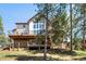 Back of house showing the deck and surrounding landscape at 23 Hess Ave, Golden, CO 80401