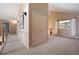 Upstairs hallway featuring neutral colors, carpet flooring and exterior view at 23 Hess Ave, Golden, CO 80401