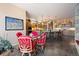 Open-concept kitchen features a breakfast bar, wood cabinetry, stainless appliances, and adjoining breakfast nook at 23 Hess Ave, Golden, CO 80401