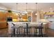 Modern kitchen with a large island, stylish bar stools, and stainless steel appliances at 23 Hess Ave, Golden, CO 80401