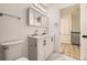 Well-lit bathroom showcasing a dual sink vanity and medicine cabinets at 3200 S Federal Blvd # 5, Denver, CO 80236
