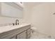 Stylish powder room features marble countertop and modern black faucet at 3200 S Federal Blvd # 5, Denver, CO 80236