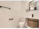 Modern half bathroom with sleek vanity and black fixtures at 3200 S Federal Blvd # 5, Denver, CO 80236