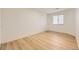 Bright bedroom with wood flooring at 3200 S Federal Blvd # 5, Denver, CO 80236