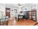 Cozy dining room with decorative fireplace and hardwood floors near the home's entry at 525 N Pearl St, Denver, CO 80203