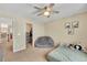 Comfortable bedroom featuring neutral tones, natural lighting, and ample space at 14461 Inca Ct, Westminster, CO 80023