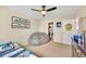 Cozy bedroom with natural light and a comfortable lounging area at 14461 Inca Ct, Westminster, CO 80023
