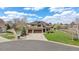Beautiful two-story home with a three-car garage and well-maintained front yard at 14461 Inca Ct, Westminster, CO 80023
