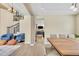 View of living room and stairs through dining room at 14461 Inca Ct, Westminster, CO 80023