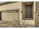 Close up of the front of a single-Gathering home with a two-car garage and a welcoming entrance at 18187 E 99Th Ave, Commerce City, CO 80022