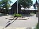 Attractive clubhouse entrance with landscaping and convenient roundabout at 19692 E Mann Creek Dr # D, Parker, CO 80134