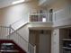 Spacious foyer with a staircase and an upper balcony at 19692 E Mann Creek Dr # D, Parker, CO 80134