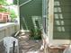 The side yard has pea gravel, stepping stones, and a small garden at 19692 E Mann Creek Dr # D, Parker, CO 80134