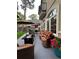 This patio features ample seating surrounding a firepit, perfect for relaxing or entertaining guests outdoors at 1160 Monaco Pkwy, Denver, CO 80220