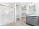 Bathroom featuring tile flooring, glass-enclosed shower, and sink with cabinet at 28610 E 8Th Pl, Watkins, CO 80137