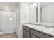 This bathroom offers a double sink vanity with a tub and shower combination at 28610 E 8Th Pl, Watkins, CO 80137
