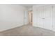 Bedroom featuring a closet with double doors at 28610 E 8Th Pl, Watkins, CO 80137