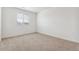 A comfortable bedroom features wall to wall carpeting, natural lighting and bright white walls at 28610 E 8Th Pl, Watkins, CO 80137