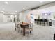 Spacious basement area with open floor plan, dining table and chairs and kitchen at 3131 Keepsake Way, Castle Rock, CO 80109
