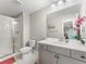 Bright bathroom with glass shower, sleek vanity, and modern fixtures at 3131 Keepsake Way, Castle Rock, CO 80109
