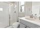 Bright bathroom with a glass-enclosed shower, modern fixtures, and neutral color palette provide a clean aesthetic at 3131 Keepsake Way, Castle Rock, CO 80109