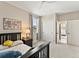 Cozy bedroom with large closet, natural light, and neutral tones creates a relaxing atmosphere at 3131 Keepsake Way, Castle Rock, CO 80109
