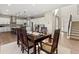 This formal dining room has an open concept to the kitchen, making it the perfect spot to entertain at 3131 Keepsake Way, Castle Rock, CO 80109