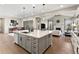 Open floorplan boasts an eat in kitchen, living room and dining area perfect for entertaining and cooking at 3131 Keepsake Way, Castle Rock, CO 80109