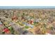 Aerial view of the property in a residential area with a clear view of downtown in the background at 2544 S Raleigh St, Denver, CO 80219