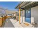 Inviting front porch with a shade and seating area at 2544 S Raleigh St, Denver, CO 80219