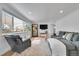 Inviting living room with hardwood floors, lots of natural light, and stylish furniture at 2544 S Raleigh St, Denver, CO 80219
