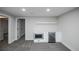 Finished basement featuring a wet bar with modern appliances and a convenient wine fridge at 320 S Jersey St, Denver, CO 80224