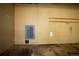 Garage wall featuring electrical box and outlets at 320 S Jersey St, Denver, CO 80224