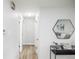 Hallway showcasing clean, white walls, minimalist decor, and access to various rooms at 320 S Jersey St, Denver, CO 80224