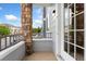 Cozy balcony with stone accents and a view of the community at 5255 Memphis St # 219, Denver, CO 80239