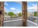 Balcony view of the community with stone pillars and blue skies at 5255 Memphis St # 219, Denver, CO 80239