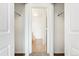 Walk-in closet view with bathroom in the background at 5255 Memphis St # 219, Denver, CO 80239