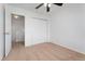 Bedroom featuring a door to the hallway and a closet at 5255 Memphis St # 219, Denver, CO 80239