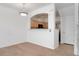 Dining area with a view into the kitchen, creating an open and inviting space at 5255 Memphis St # 219, Denver, CO 80239