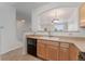 Kitchen showcasing ample countertop space and essential appliances at 5255 Memphis St # 219, Denver, CO 80239