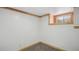 Unfurnished basement with carpet and a window at 766 Fulton Ave, Brighton, CO 80601