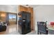 Eat-in kitchen with luxury vinyl flooring and updated cabinets at 766 Fulton Ave, Brighton, CO 80601