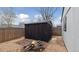 Outdoor shed with wood pile and small rocks at 766 Fulton Ave, Brighton, CO 80601