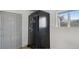 View of the storage room featuring a large safe and a window at 766 Fulton Ave, Brighton, CO 80601