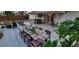 An idyllic outdoor dining area featuring a long table beautifully set for an elegant meal at 12292 W 65Th Ave, Arvada, CO 80004