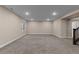 Large basement featuring neutral paint, carpet, stairs, and ample open space at 549 Tippen Pl, Castle Rock, CO 80104