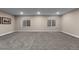 Spacious basement area with carpet and egress windows providing ample natural light at 549 Tippen Pl, Castle Rock, CO 80104