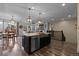 View of a open-concept living space connecting the kitchen, dining, and living areas, creating a sense of flow at 549 Tippen Pl, Castle Rock, CO 80104