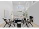 Spacious living room with a white couch and black coffee table at 1919 Bellaire St, Denver, CO 80220