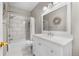 Neutral bathroom with white vanity, and shower over tub at 13028 Grant W Cir # A, Thornton, CO 80241